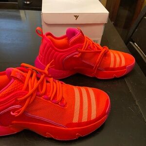Adidas Trae Unlimited basketball shoe, men’s 9.5 / UK 9. NIB/NWT, red/orange